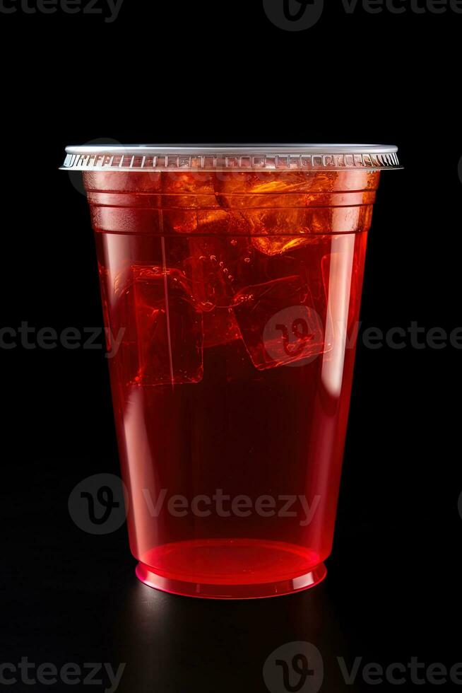 rojo bebida en un el plastico taza aislado en un negro antecedentes. tomar lejos bebidas concepto. ai generado foto