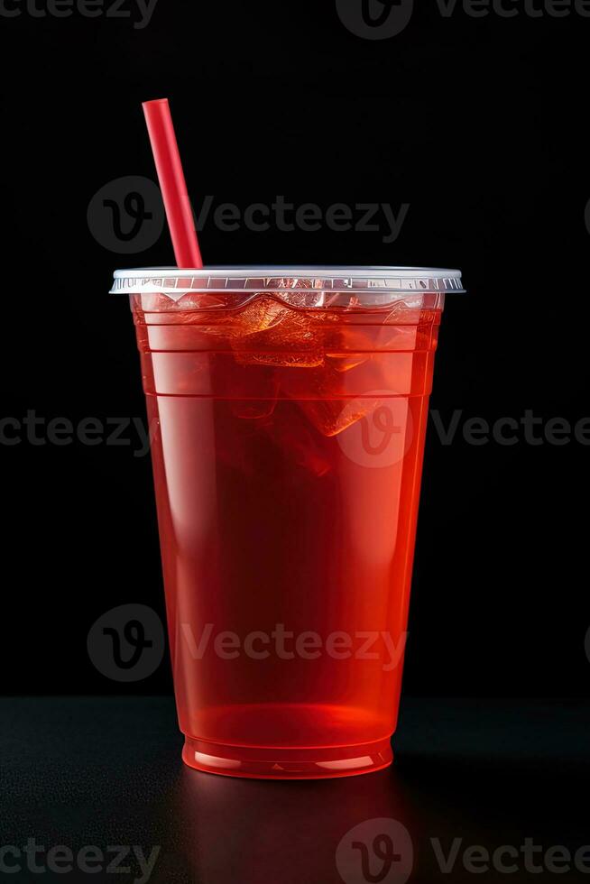 rojo bebida en un el plastico taza aislado en un negro antecedentes. tomar lejos bebidas concepto. ai generado foto