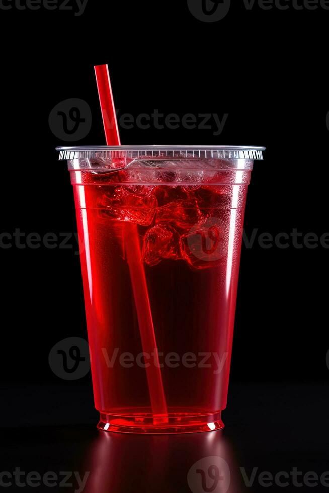 Red drink in a plastic cup isolated on a black background. Take away drinks concept. ai generated photo