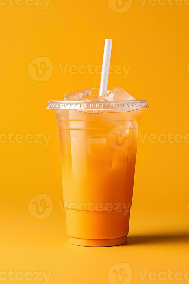 Orange color drink in a plastic cup isolated on a orange color background. Take away drinks concept. ai generated photo