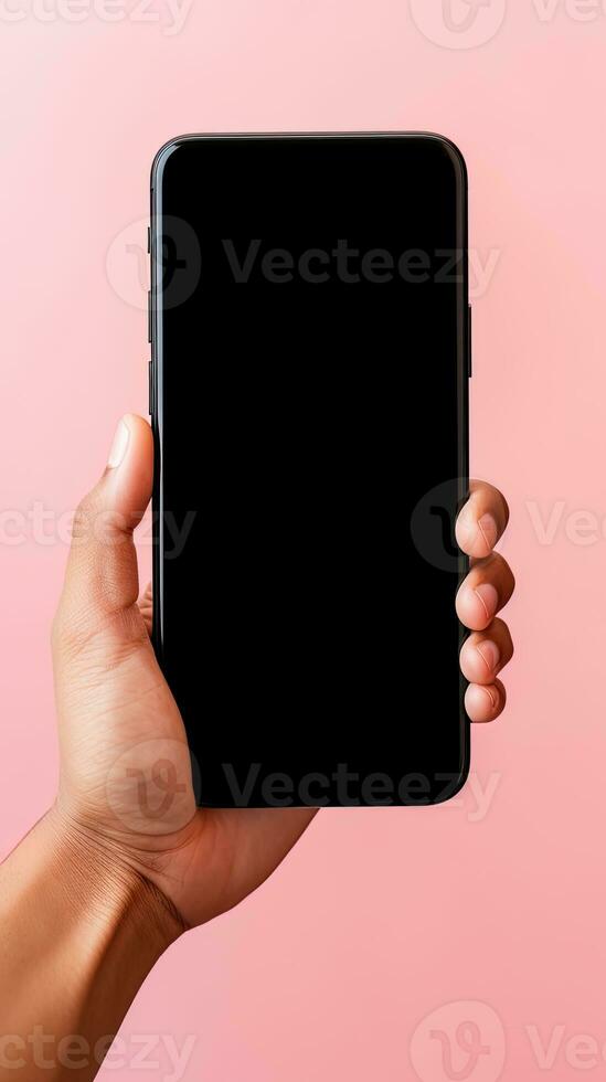 Hand holding smartphone with a black blank screen isolated on a pink background. ai generated photo