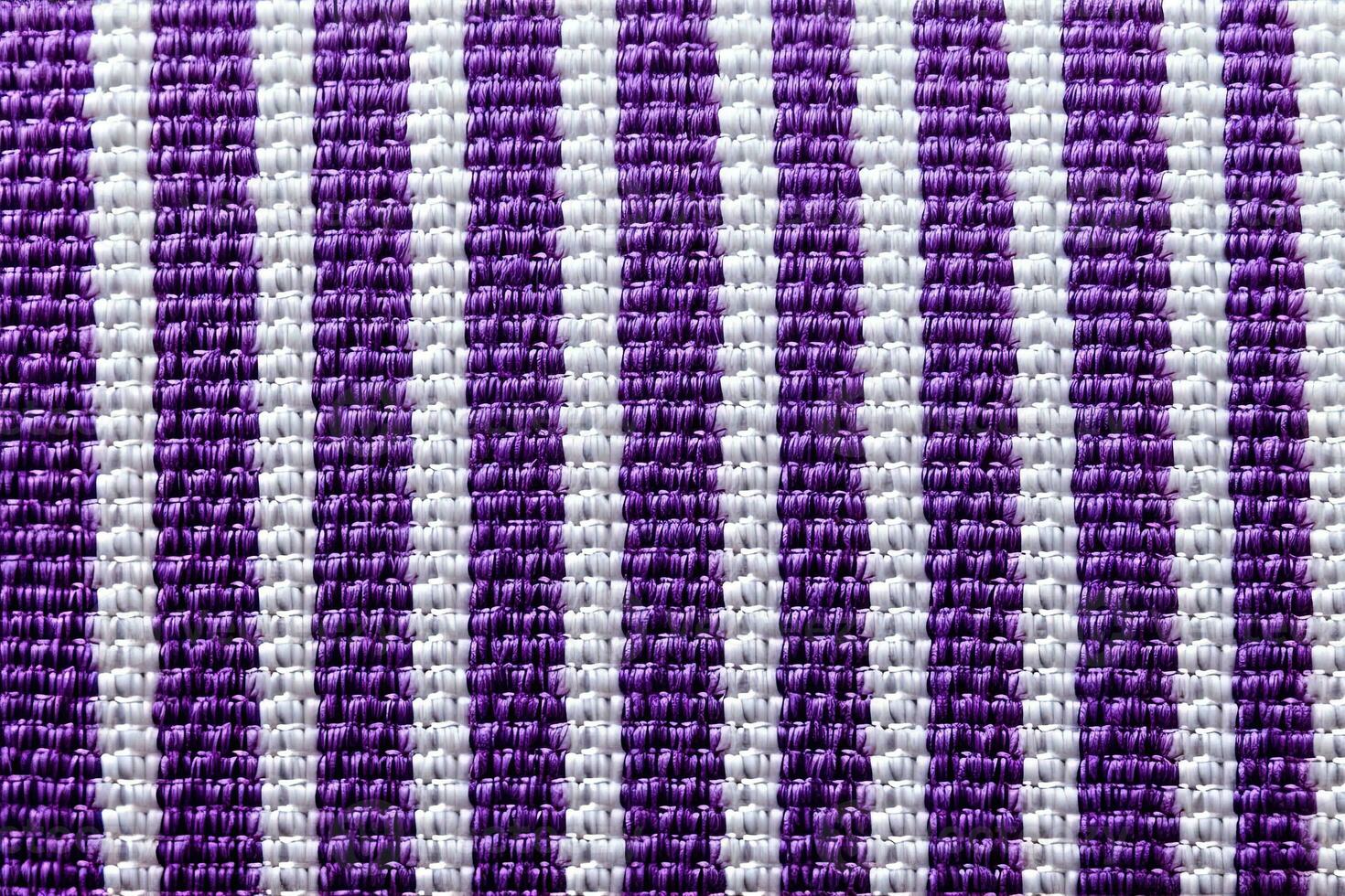 púrpura y blanco a rayas tela textura antecedentes. ai generado foto