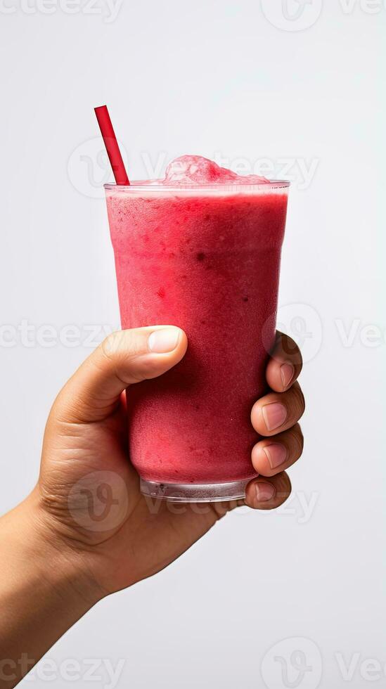 Hand holds a glass of fresh strawberry smoothie. Summer drink milkshake and refreshment organic concept. ai generated photo