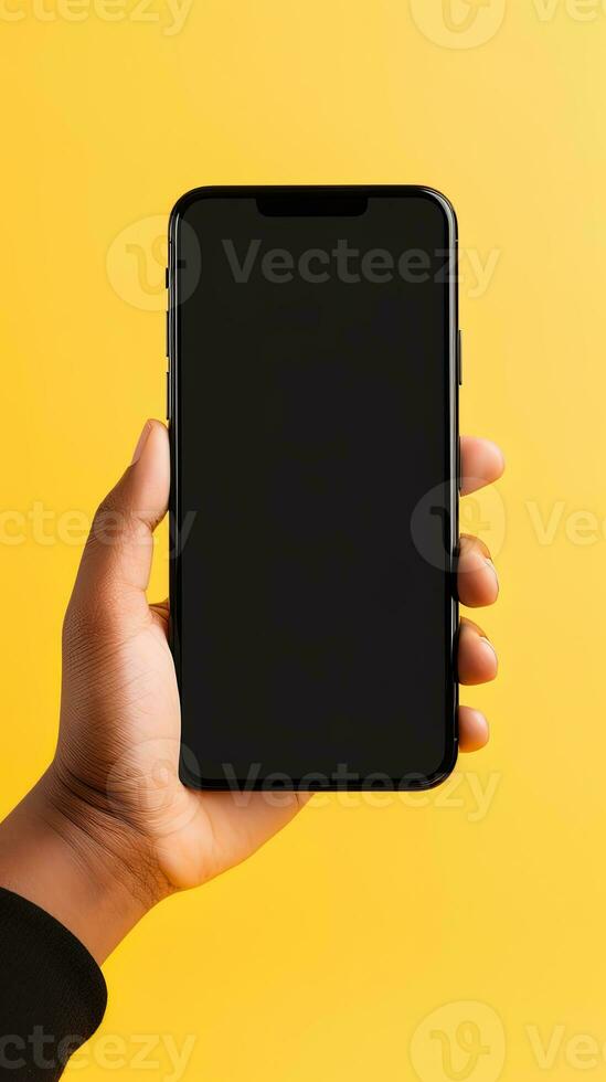 Hand holding smartphone with a black blank screen isolated on a yellow background. ai generated photo