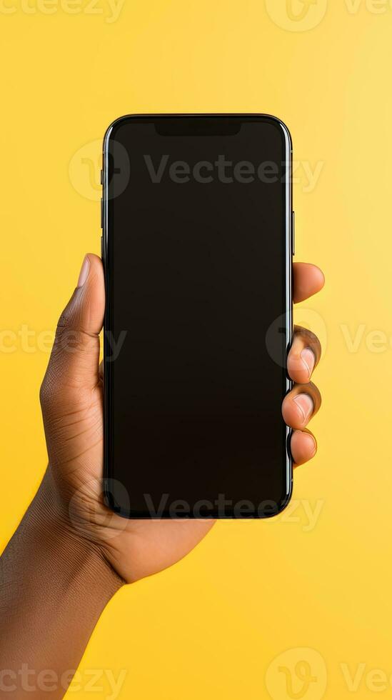Hand holding smartphone with a black blank screen isolated on a yellow background. ai generated photo