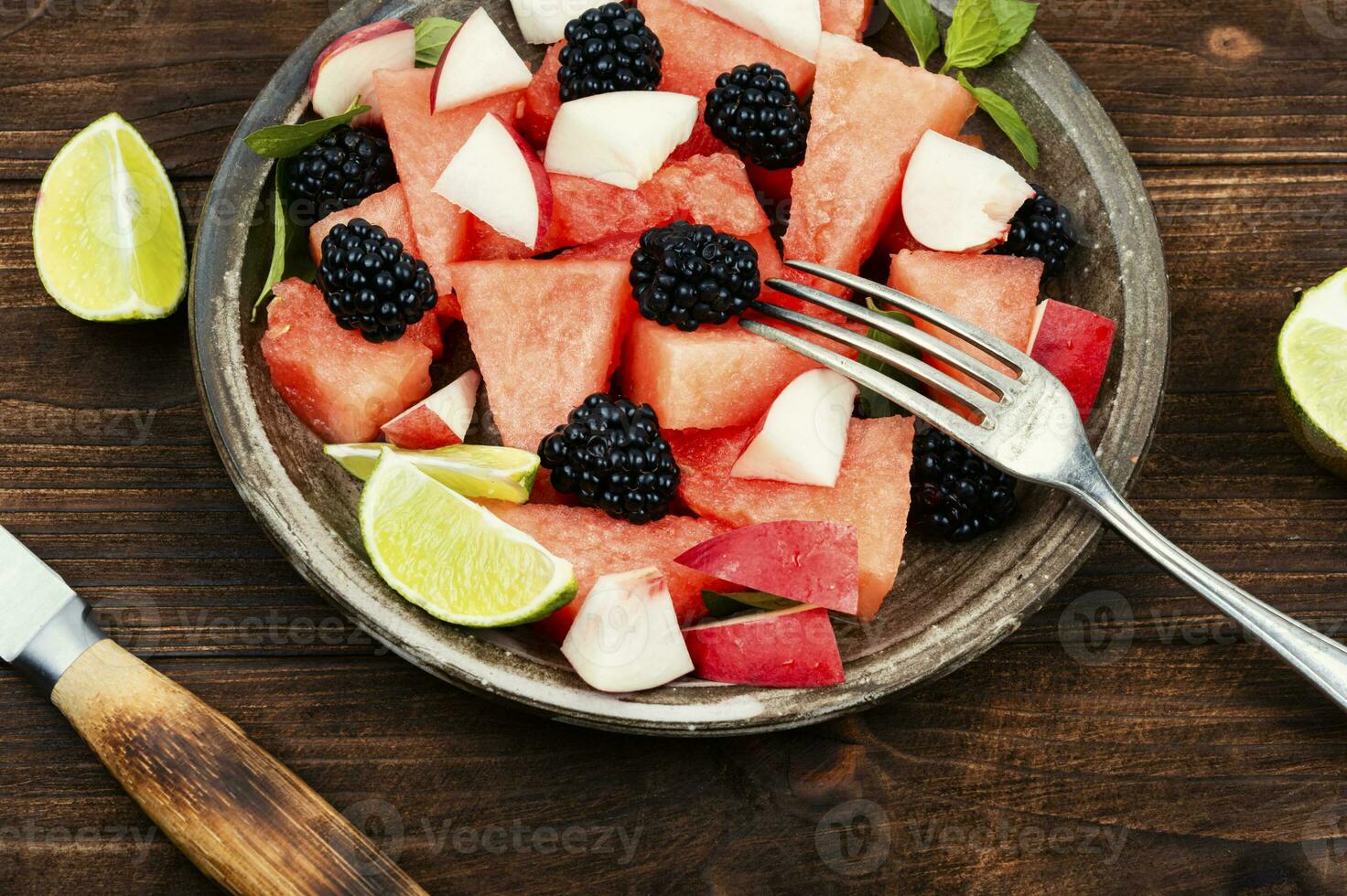 Fruity watermelon salad on a plate. photo