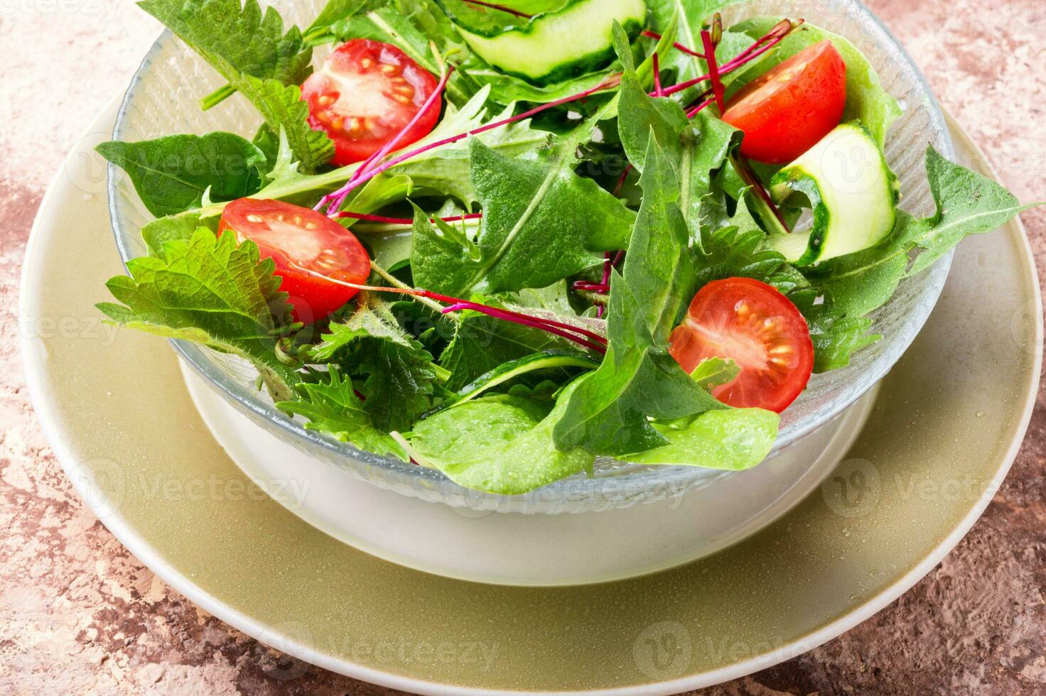 Bowl of salad with greens photo