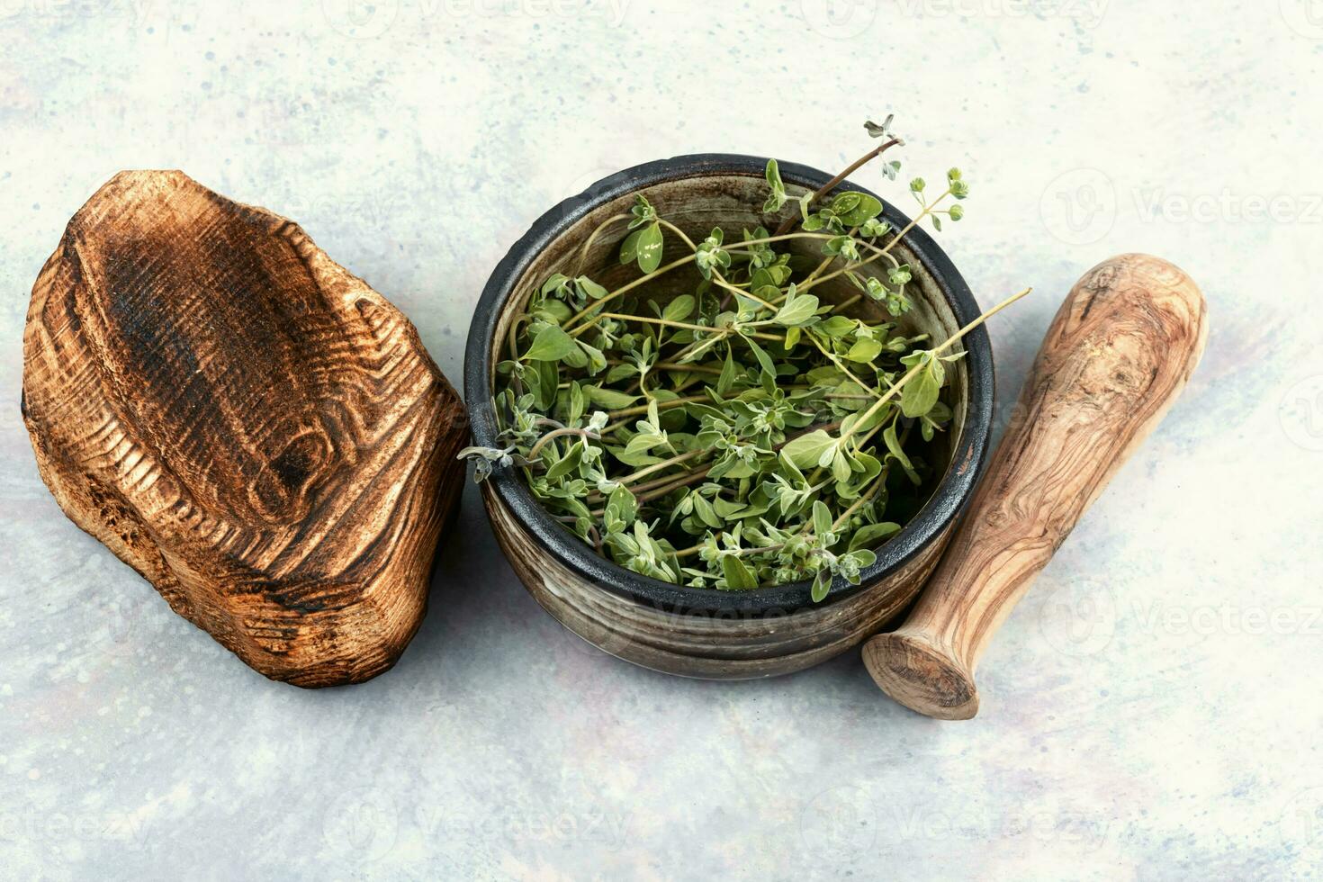 Fresh marjoram spice on the kitchen table. photo