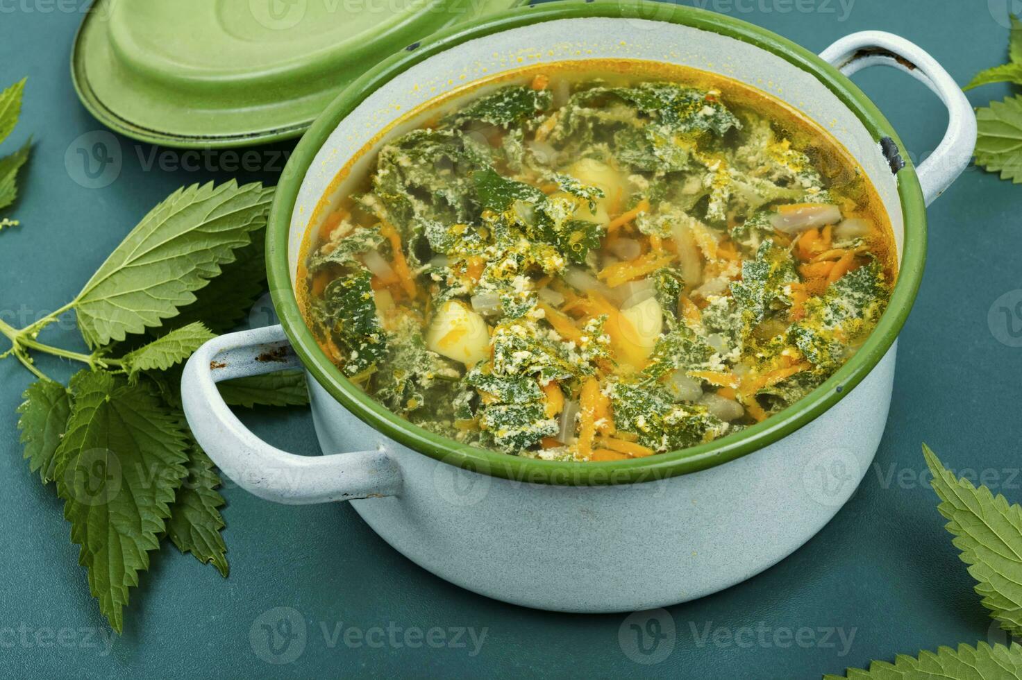 Seasonal fresh nettle soup. photo