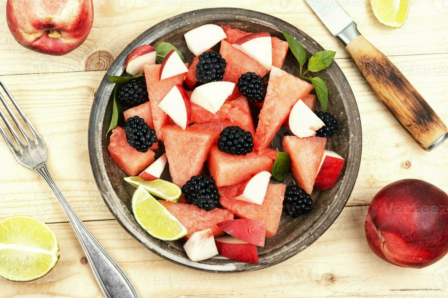 Fruity watermelon salad on a plate. photo