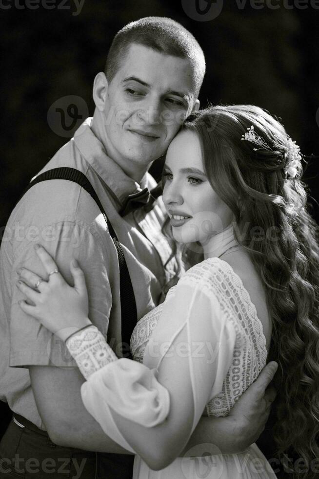wedding walk of the bride and groom in a coniferous photo