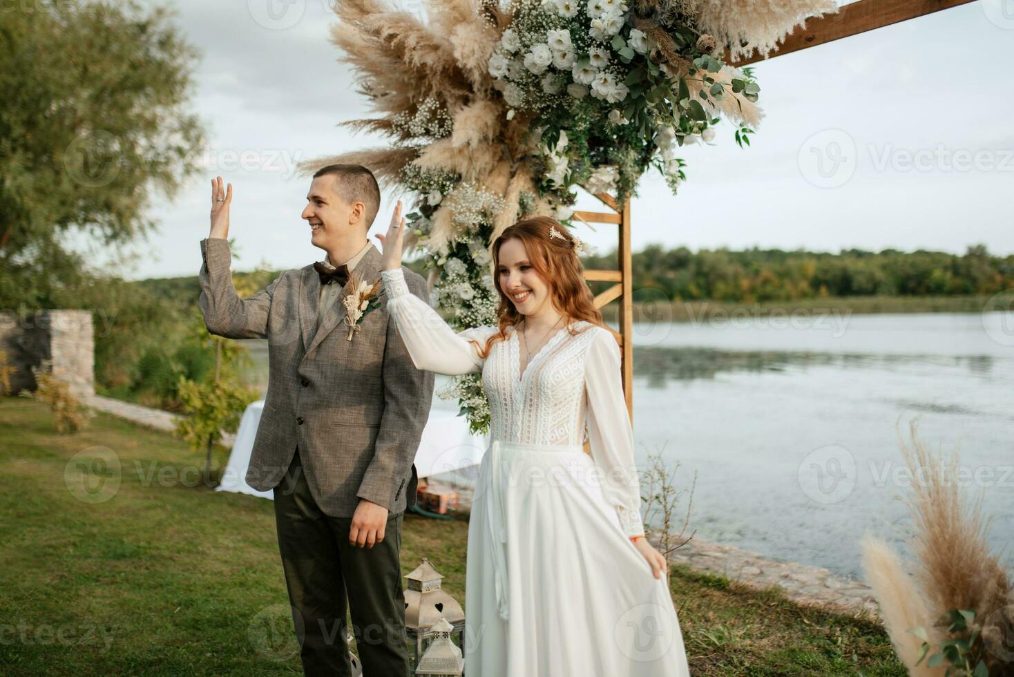 wedding ceremony of the newlyweds in a country cottage photo