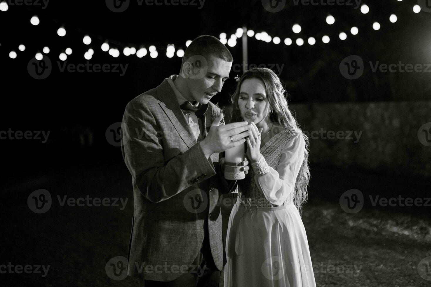 transfer of wedding fire with the help of candles the newlyweds photo