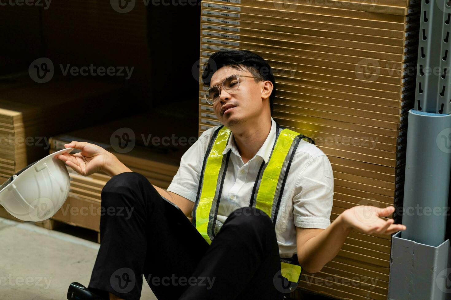 Work stress concept. Workers are stressed and tired from working in the warehouse. stressed, depressed, tired, bored photo