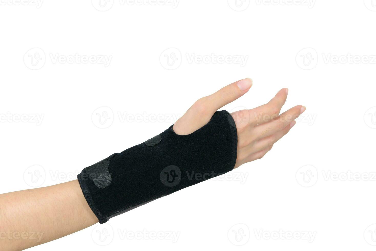 women hand with wrist splint for right hand isolated on white background with path photo