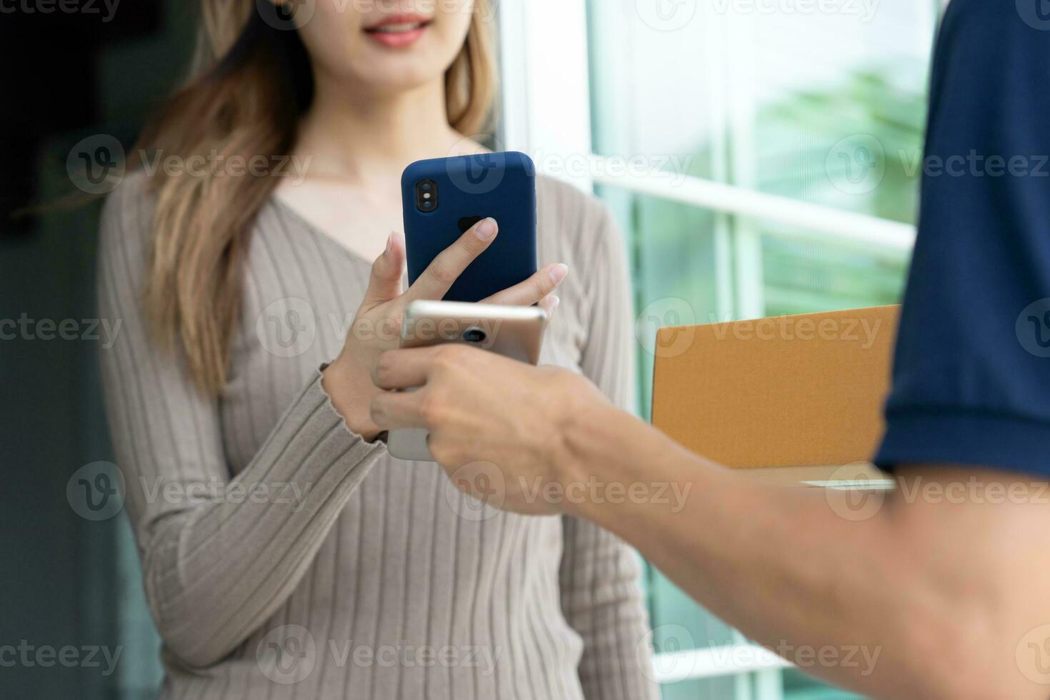 Happy smile Asian woman scan QR code for pay of food. Delivery man send deliver express. online shop, paper container, takeaway, postman, delivery service, packages, electronic money, Digital transfer photo