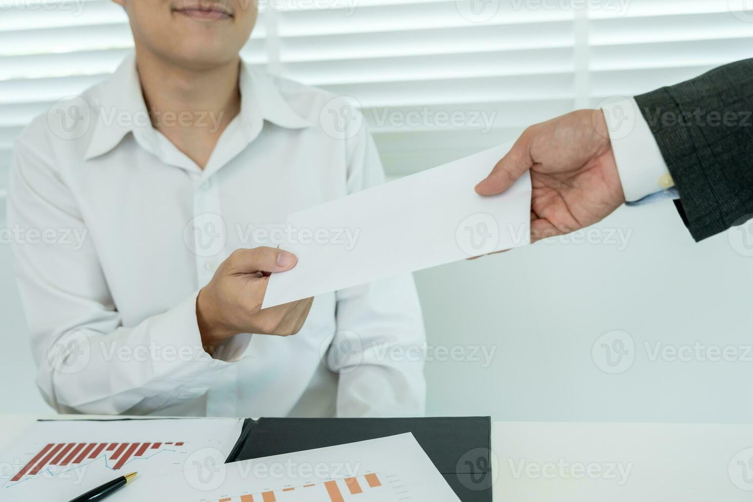 Businessmen receive salary or bonuses from management or Boss. Company give rewards to encourage work. Smiling businessman enjoying a reward at the desk in the office. photo
