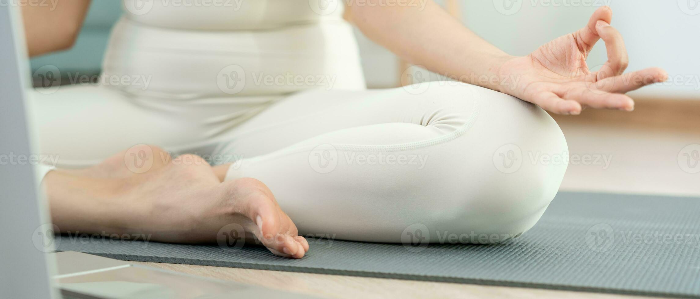 woman practicing meditate in condominium. Asian woman do exercises in morning. balance, recreation, relaxation, calm, good health, happy, relax, healthy lifestyle, reduce stress, peaceful, Attitude. photo