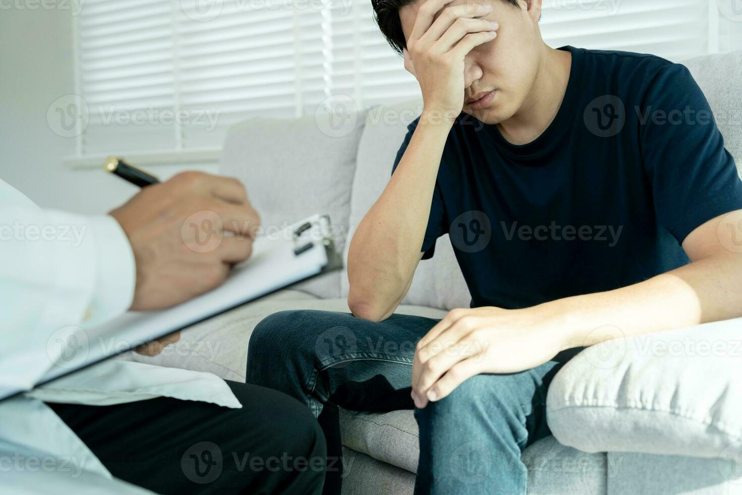 man with mental health problems is consulting. psychiatrist is recording the patient's condition for treatment. encouragement, love and family problem, bipolar , depression patient, protect suicide photo