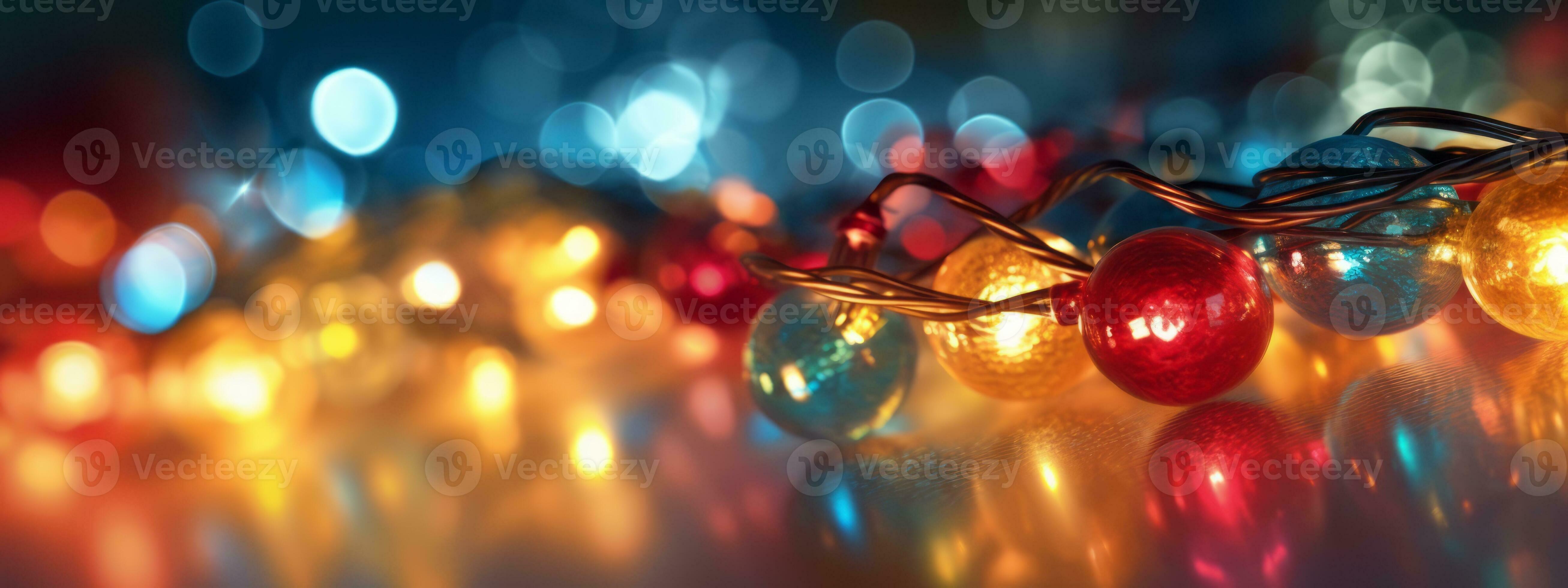 A closeup shot of twinkling Christmas lights in vibrant colors