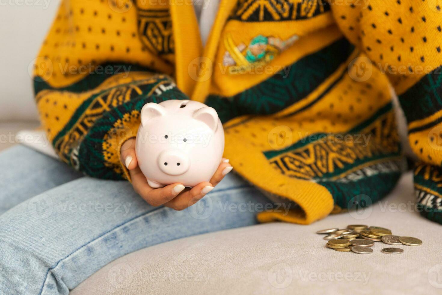 Saving money investment for future. Female woman hands holding pink piggy bank and putting money coin. Saving investment budget business wealth retirement financial money banking concept. photo