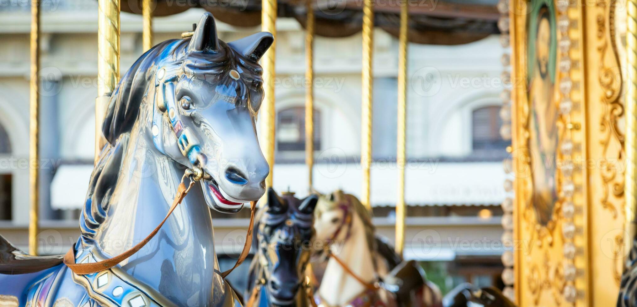 Florence, Italy - vintage carousel horse - antique attraction. photo