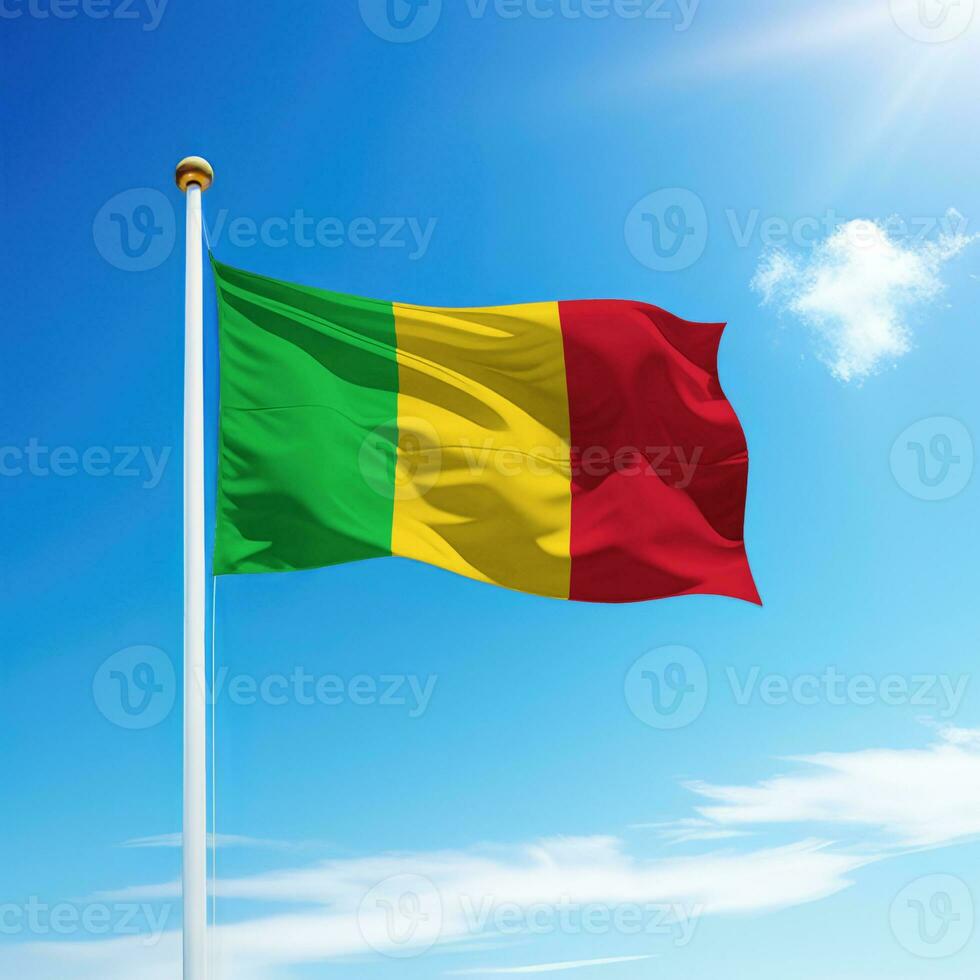 Waving flag of Mali on flagpole with sky background. photo