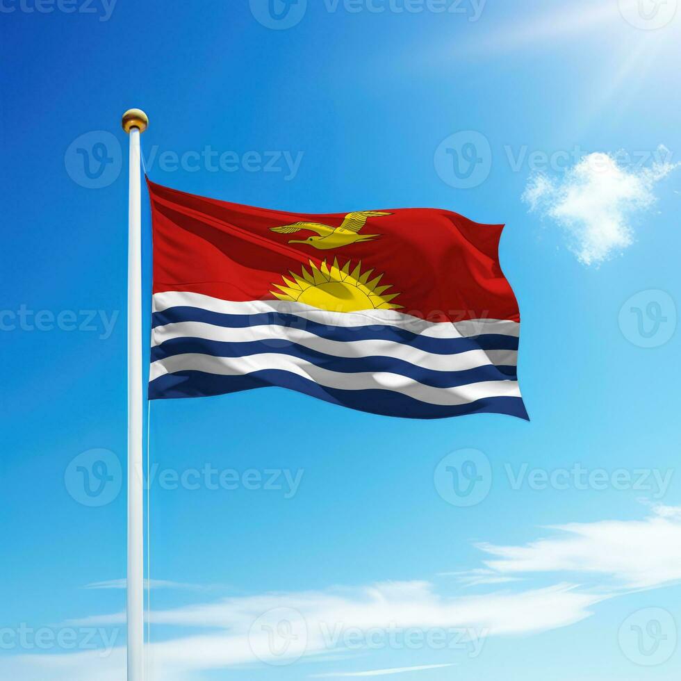 Waving flag of Kiribati on flagpole with sky background. photo