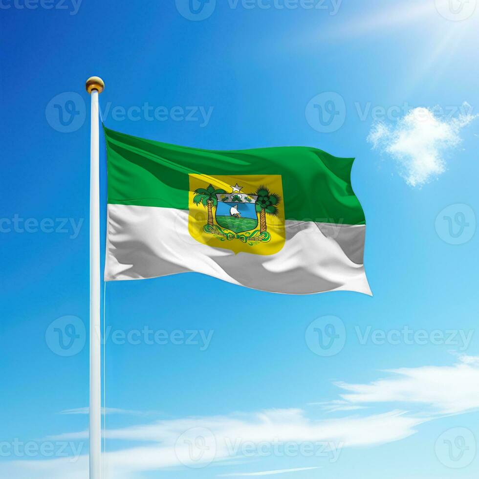 Waving flag of Rio Grande do Norte is a state of Brazil on flagpole photo