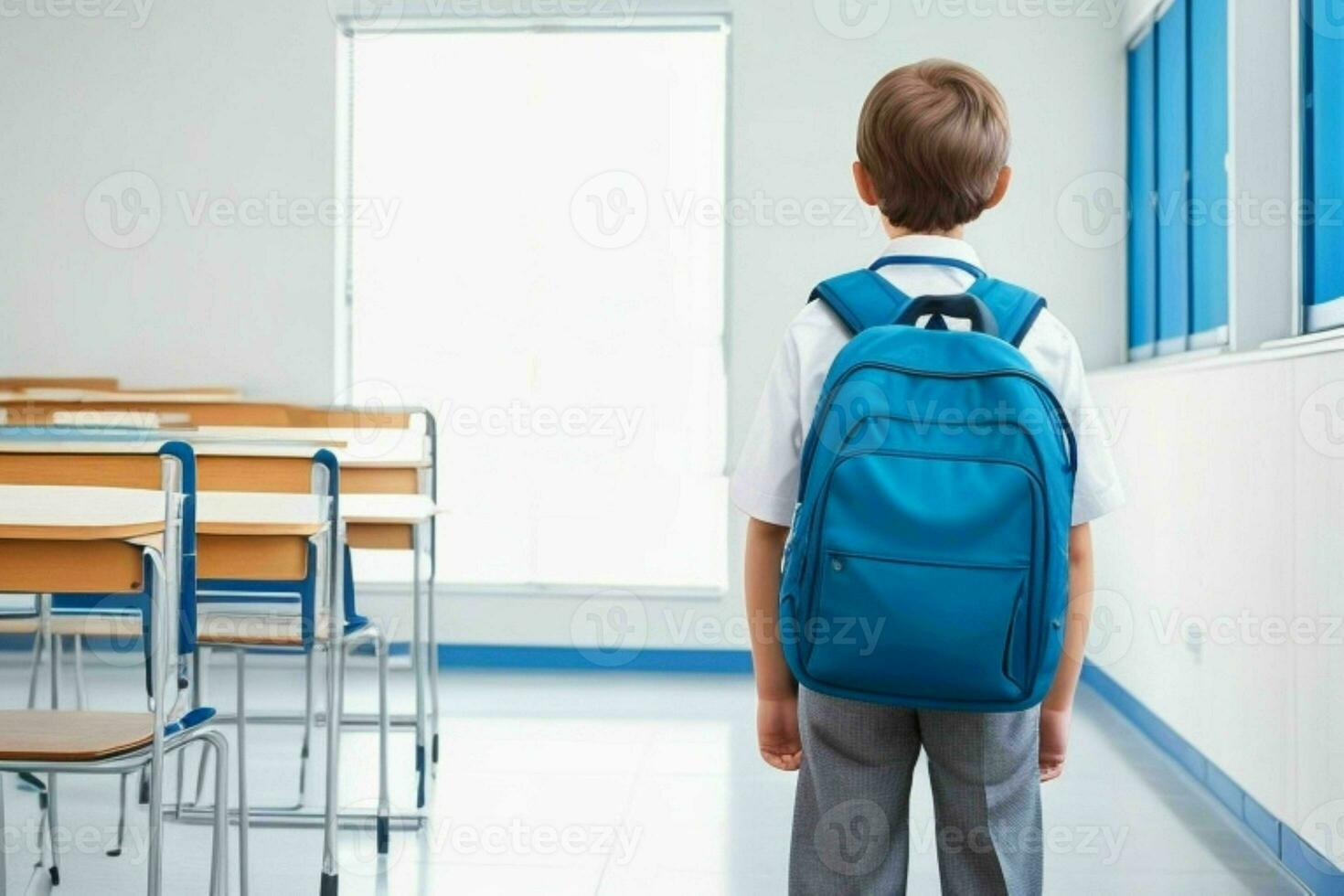Back view of a schoolboy with a backpack standing in the classroom.  AI Generative Pro Photo