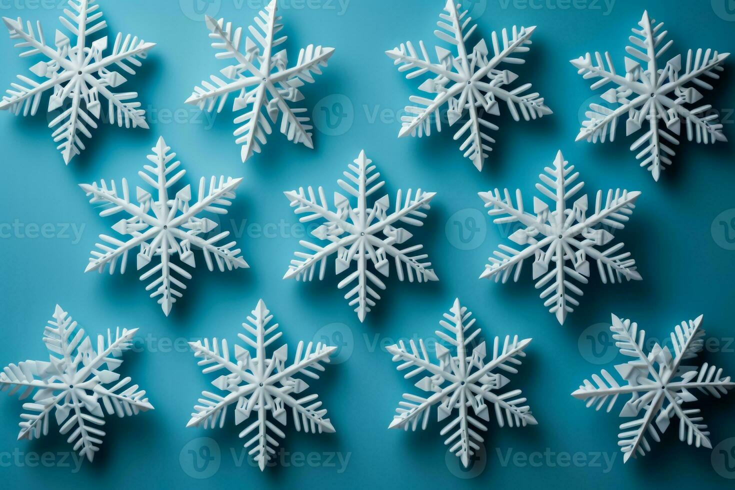 Detailed shot of DIY snowflakes on New Year isolated on a gradient background photo