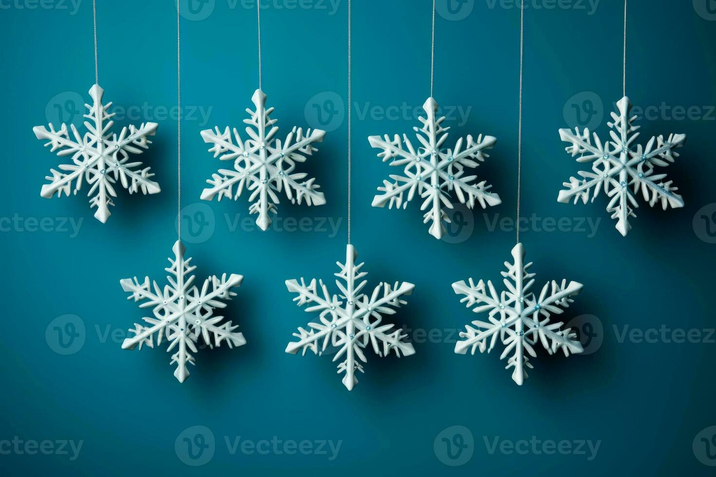 Detailed shot of DIY snowflakes on New Year isolated on a gradient background photo