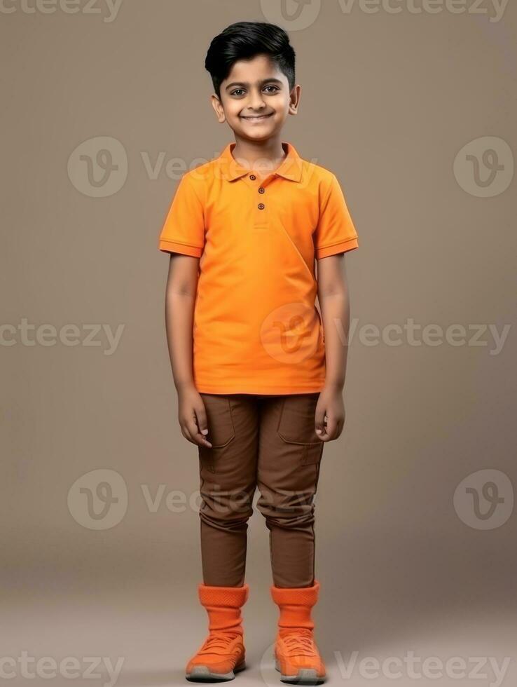 Happy Indian kid in casual clothing against a neutral background AI Generative photo
