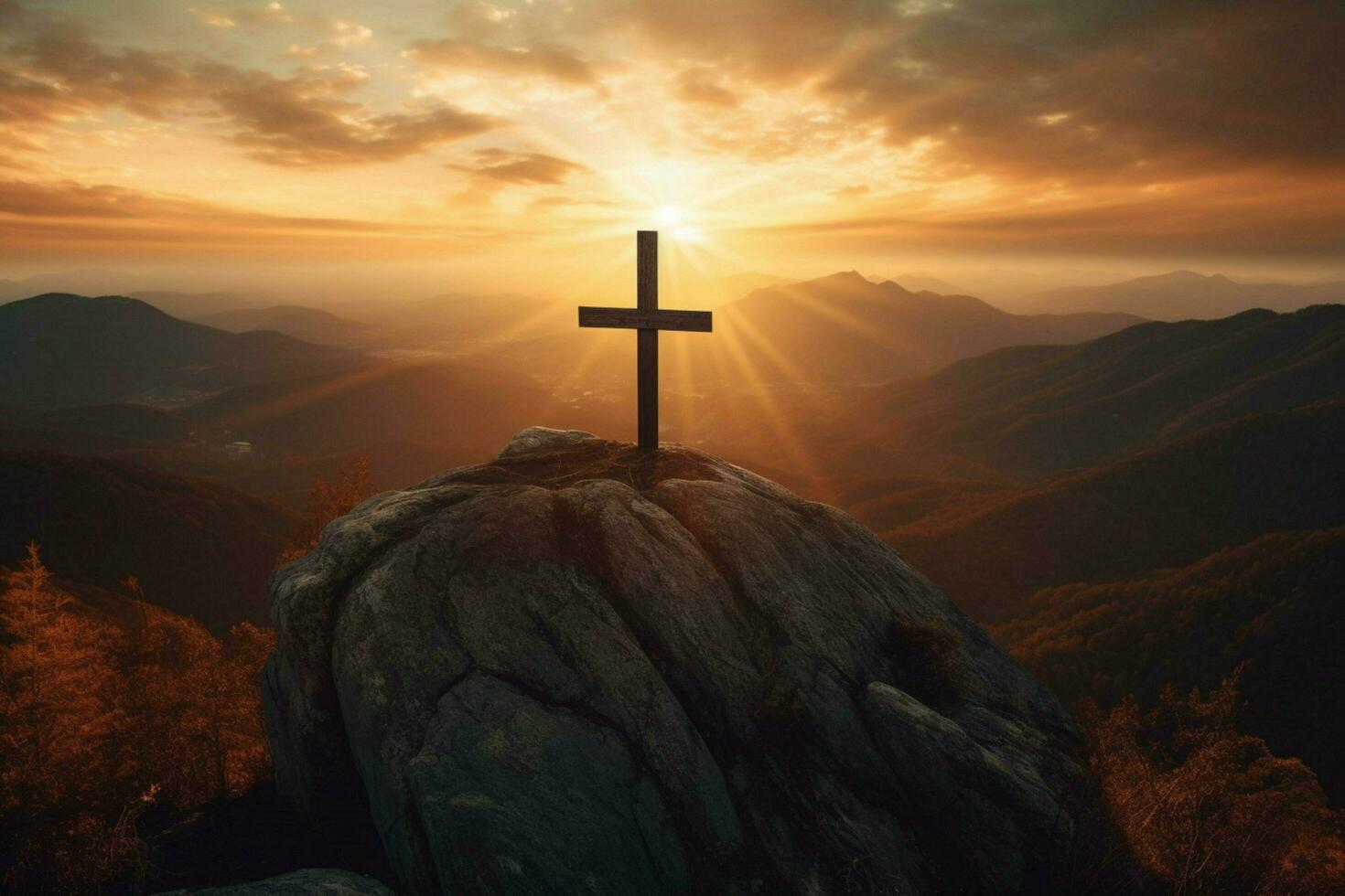 cross on a mountain with the sun setting behind i photo
