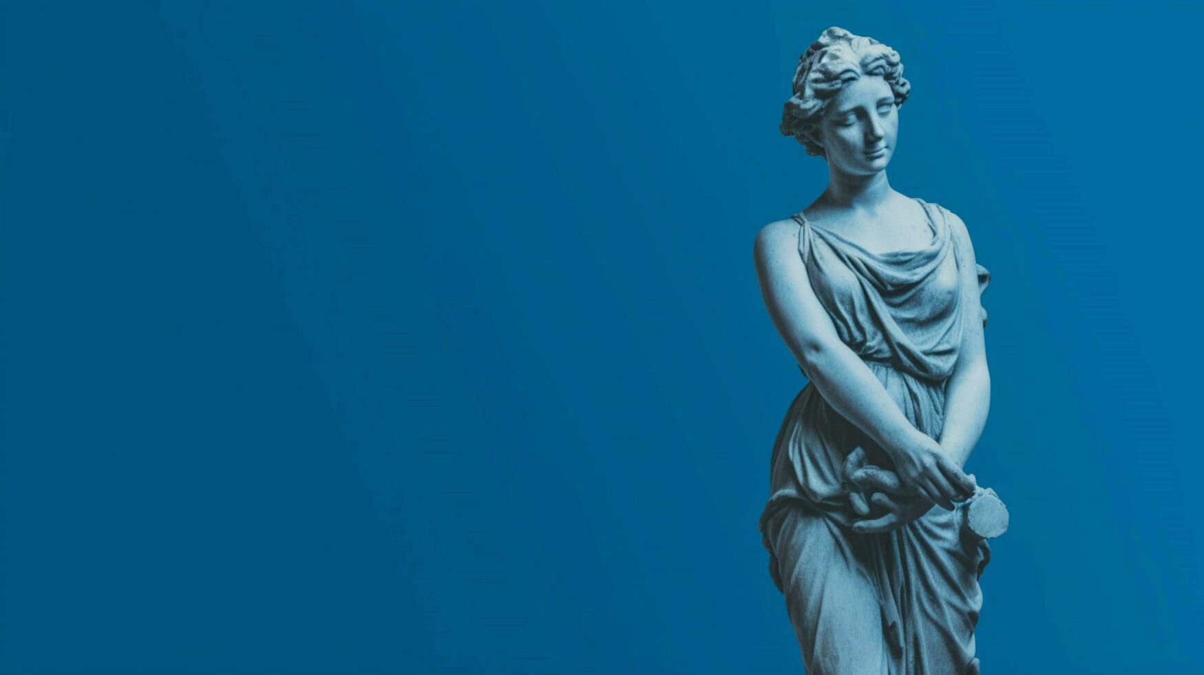 a statue of a girl with a blue background photo