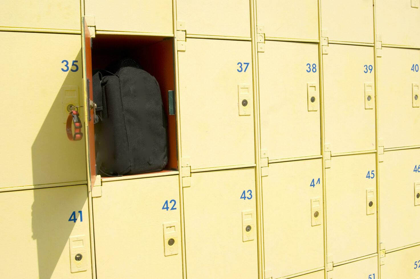 a row of yellow and orange lockers photo