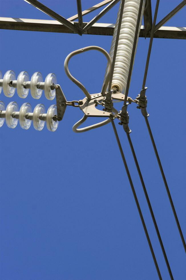 a close up of a power line with wires attached photo