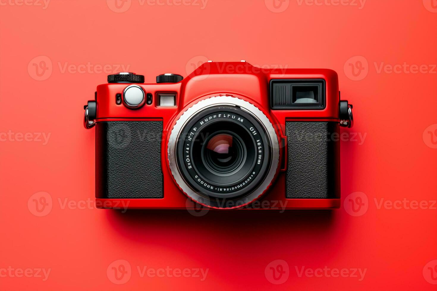 Retro camera isolated on red background. Flat lay, top view photo