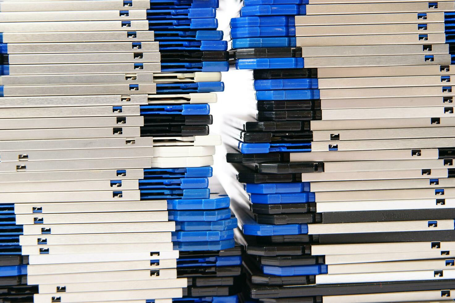 a pile of floppy disks photo