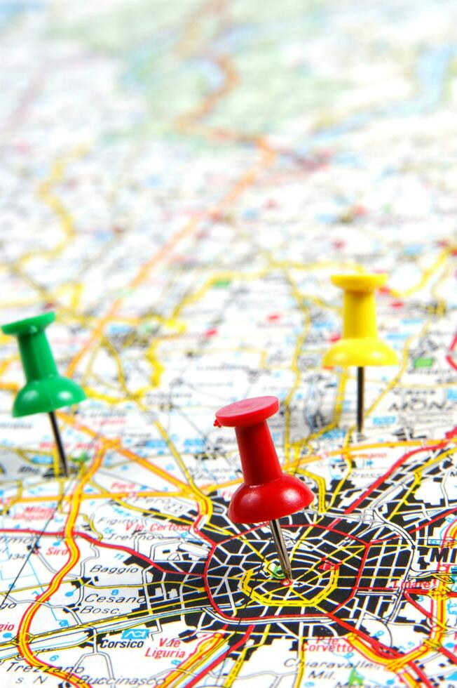 a red push pin is on a map of a city photo