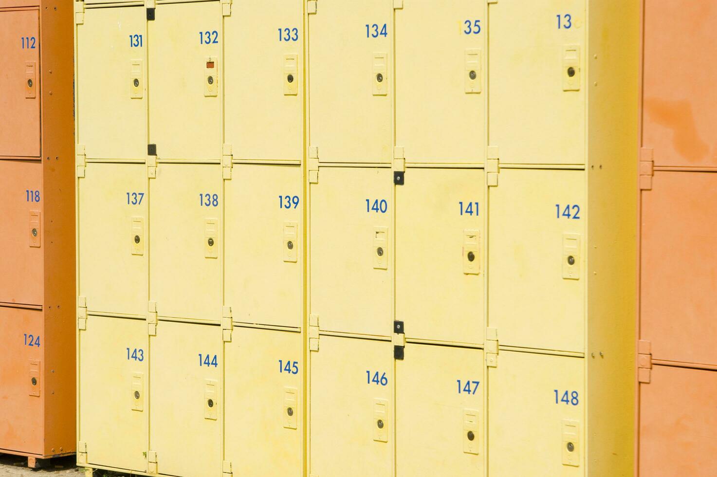 a row of yellow and orange lockers photo