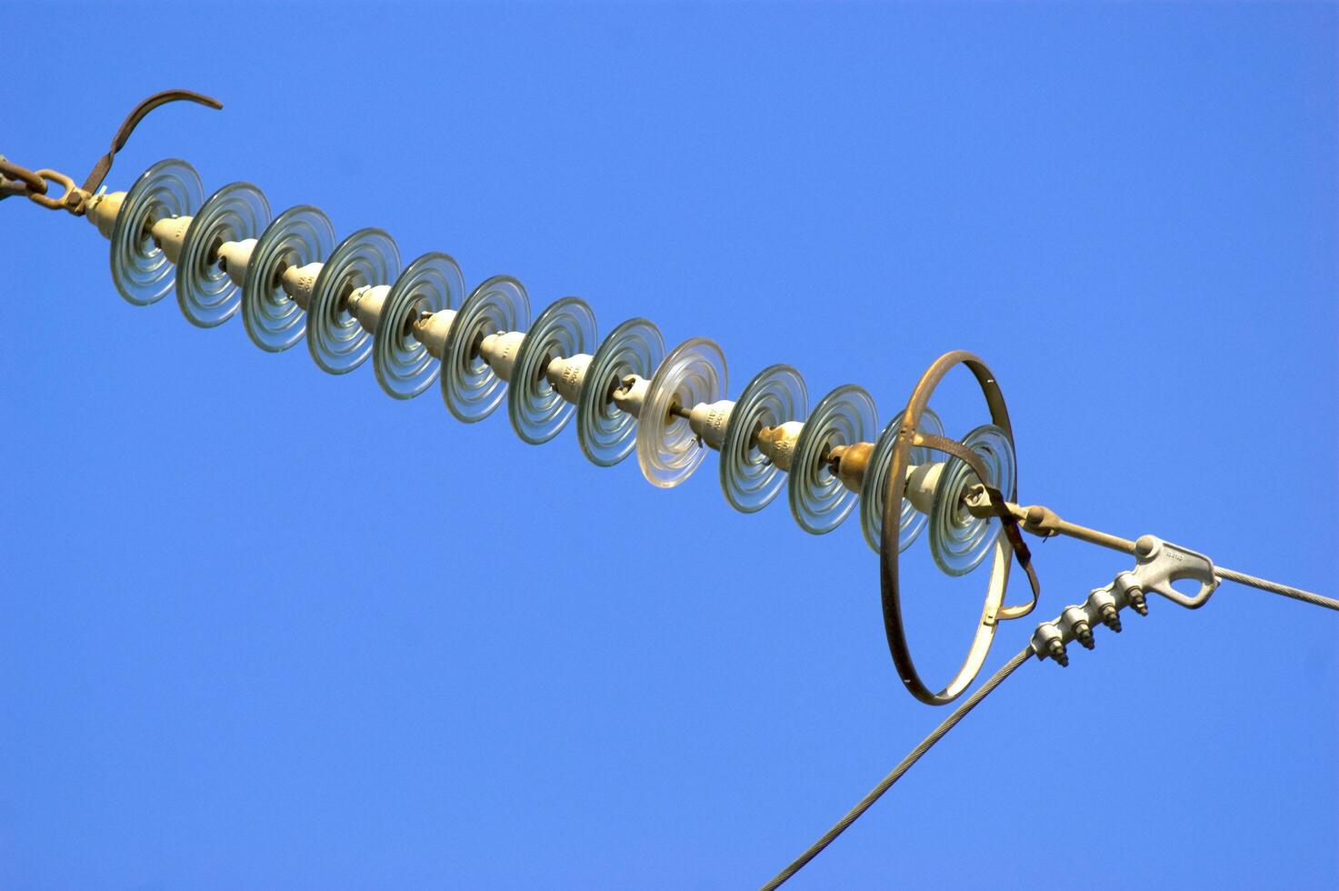 a close up of a power line with wires attached photo