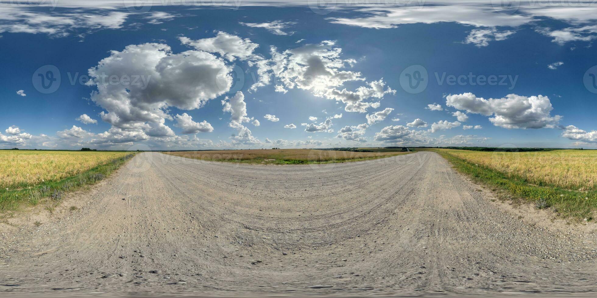 360 hdri panorama on white sand gravel road with clouds on blue sky in equirectangular spherical  seamless projection, skydome replacement in drone panoramas and game development or VR content photo