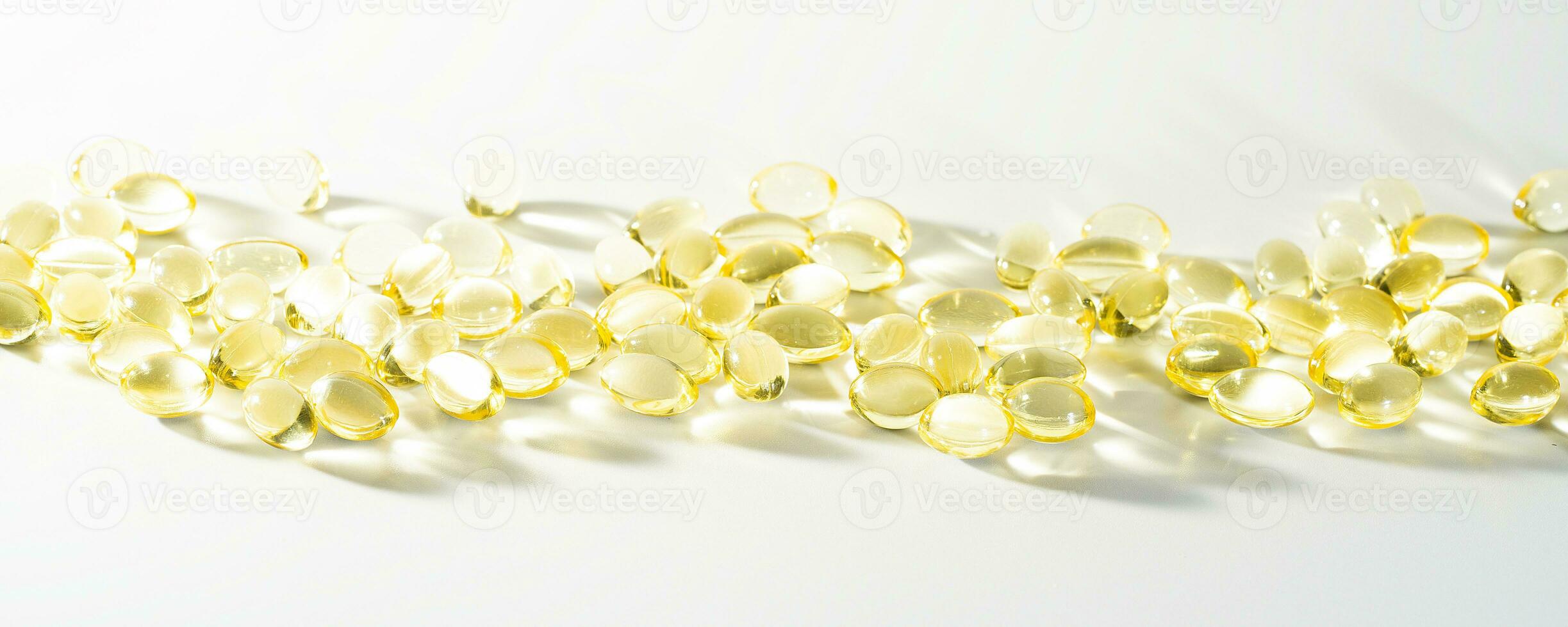 Vitamin D, omega 3, omega 6, Food supplement oil filled fish oil, vitamin A, vitamin E, flaxseed oil. photo