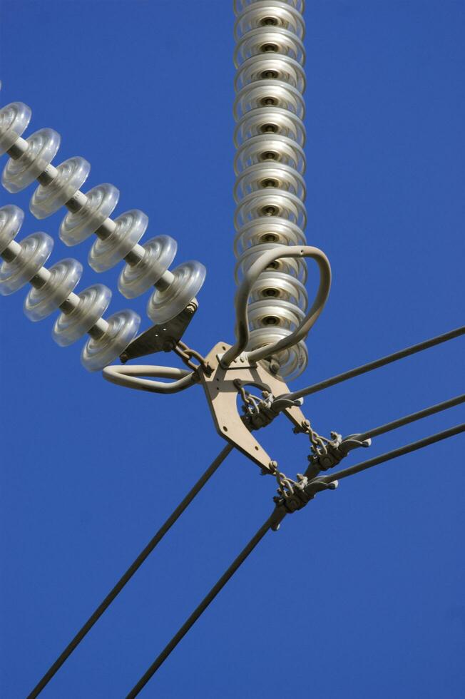 a close up of a power line with wires attached photo