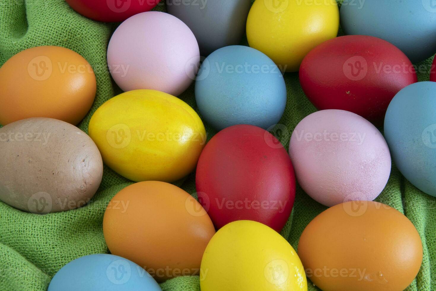 eggs painted in different colors to celebrate Easte photo