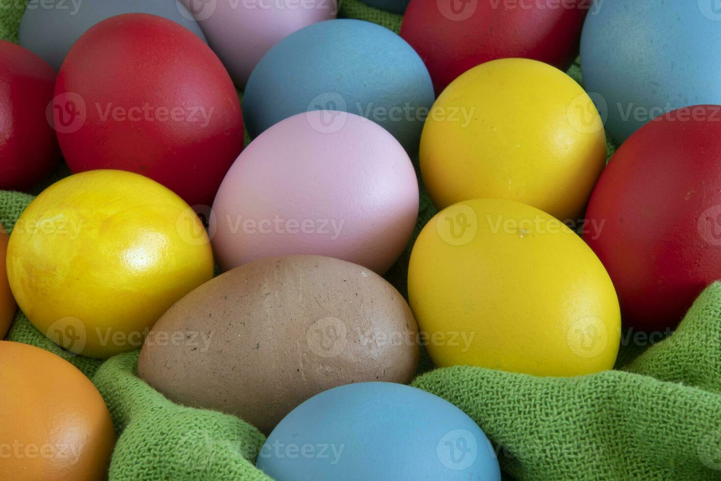 eggs painted in different colors to celebrate Easte photo