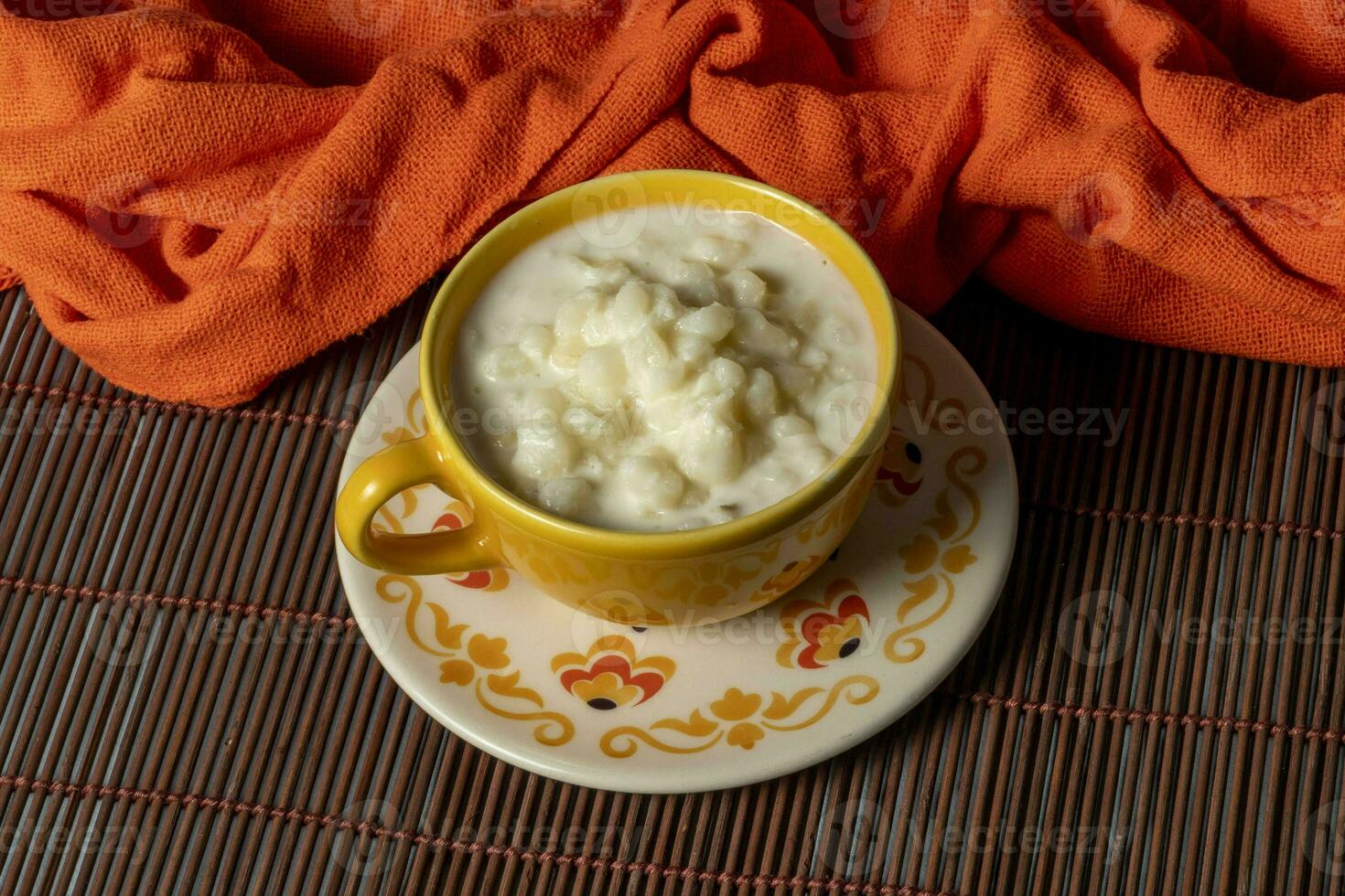 cup of canjica, typical food consumed in the Brazilian Festa Juninas photo