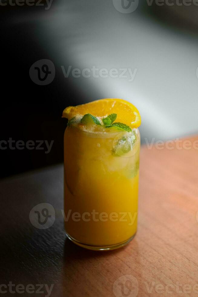 Still Life Glass of Fresh Orange Juice photo