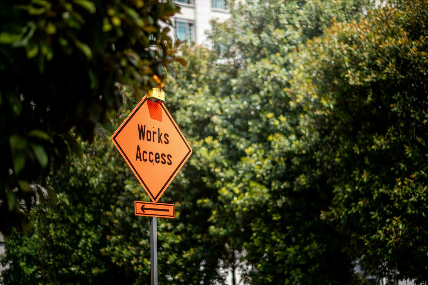 works access road sign. caution notice for industrial access only to works site photo